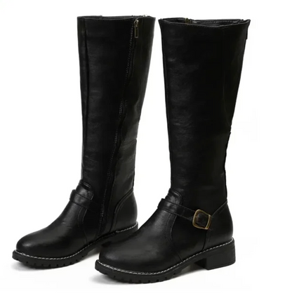 Black knee-high boots with a strap on a white background